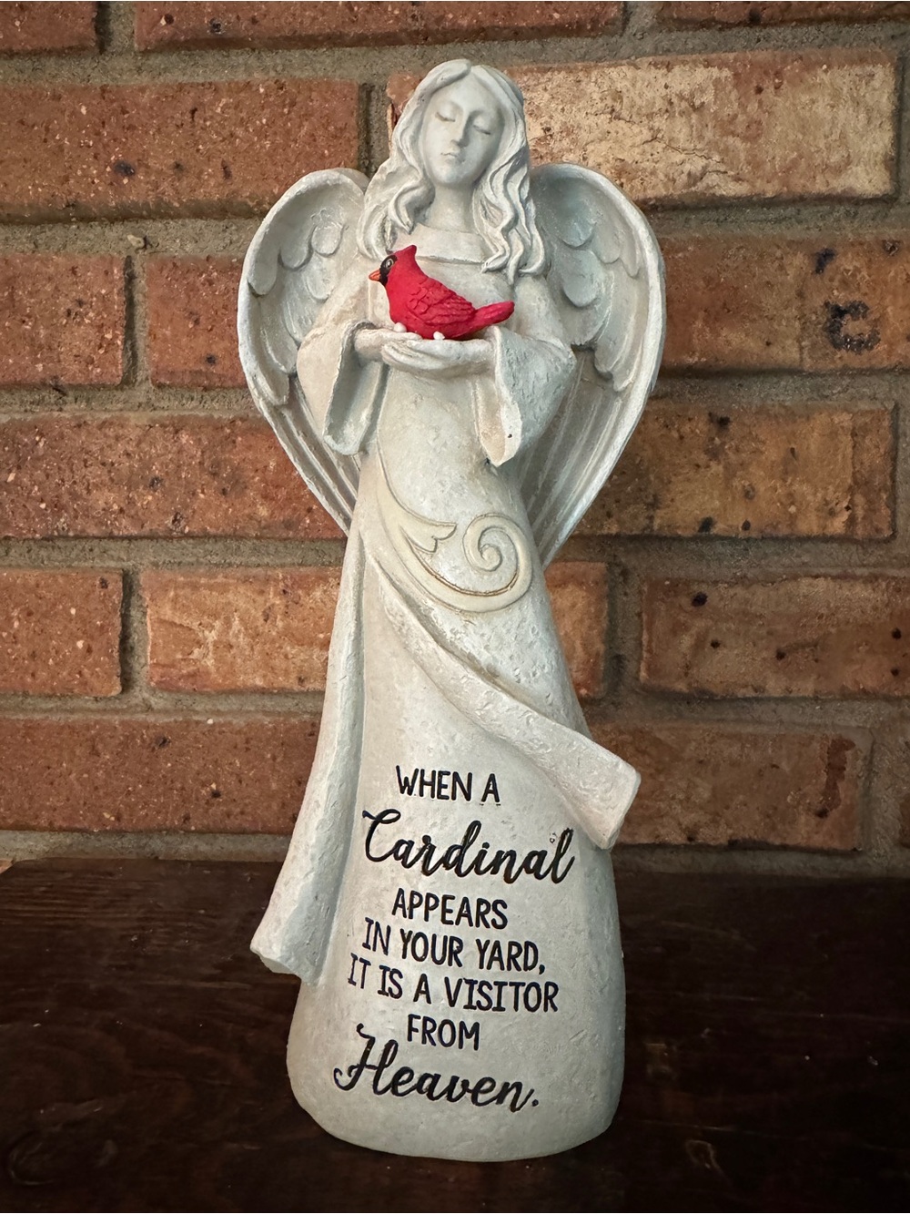 Angel Statue with Red Cardinal.